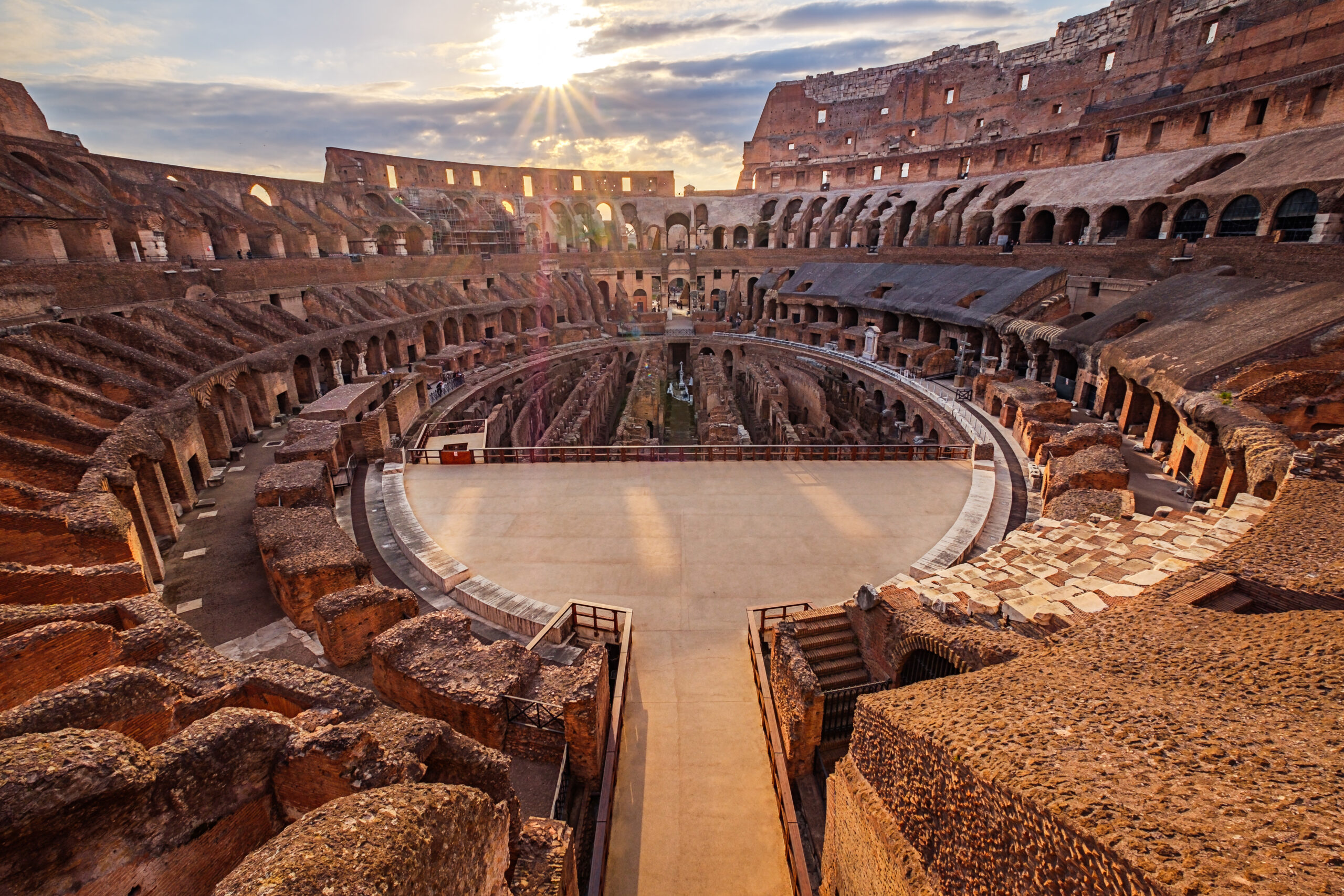 Scenic view of Roman Colosseum interior at sunset Scenic view of Roman Colosseum interior at sunset, Rome, Italy